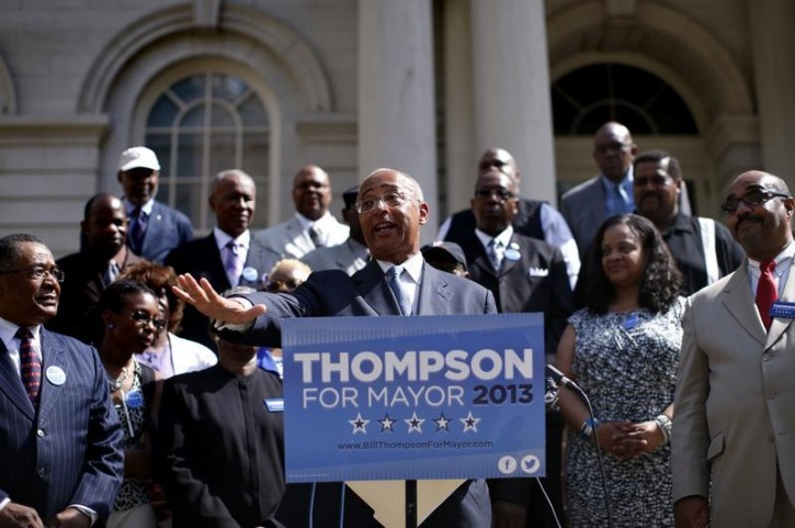 Former New York City Comptroller and current Democratic candidate for New York City Mayor William Thompson Jr speaks as he stands with local clergy leaders after he received their endorsement for Mayor in front of City Hall in New York, July 31, 2013.  REUTERS/Mike Segar 