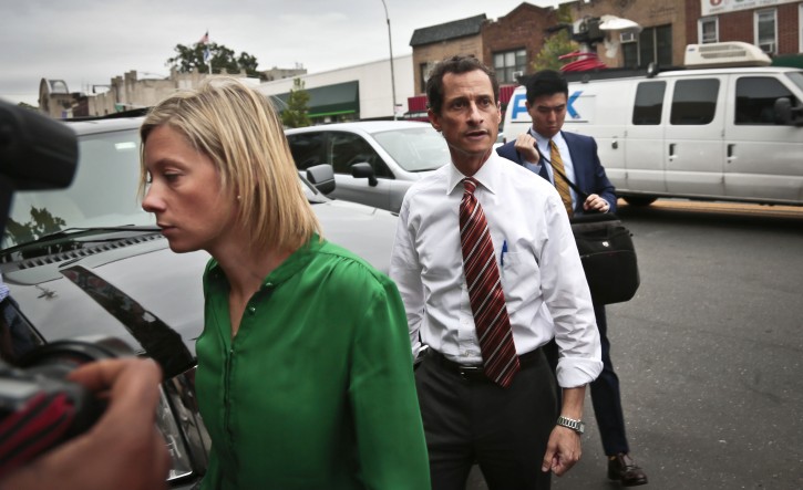 FILE - In a Thursday, July 25, 2013 file photo, New York mayoral candidate Anthony Weiner arrives with chief spokeswoman Barbara Morgan, left, at a campaign stop in New York. (AP Photo/Bebeto Matthews, File)