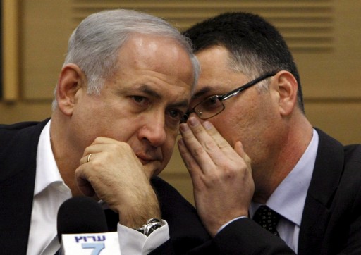 File photo of Israeli PM Benjamin Netanyahu (L) listening to 
Interior Minister Gideon Sa'ar. EPA/MIRIAM ALSTER 
