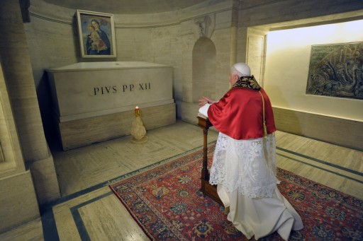 FILE -  In this file photo, Pope Benedict XVI prays in front of the tomb of Pope Pius XII on the All Souls' Day in the crypt of the St.Peter's Basilica, Vatican, 02 November 2011.  EPA/OSSERVATORE ROMANO HANDOUT EPA