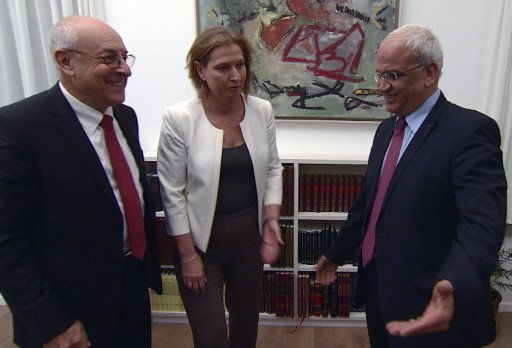 FILE - A frame grab from a video clip shows Israeli Justice Minister Tzipi Livni (C), with Saeb Erekat (R), the Palestinian Authority's Chief Negotiator in talks with Israel, and (L) Israeli negotiator Yitzhak Molcho, during a meeting at an undisclosed location in Jerusalem, late 14 August 2013. EPA/AMOS BEN GERSHOM / 