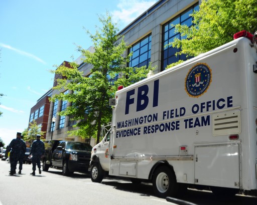 FILE: A FBI evidence response team collecting evidence in Washington, DC, USA, 18 September 2013. EPA/PEDRO A. RODRIGUEZ / NAVY MEDIA