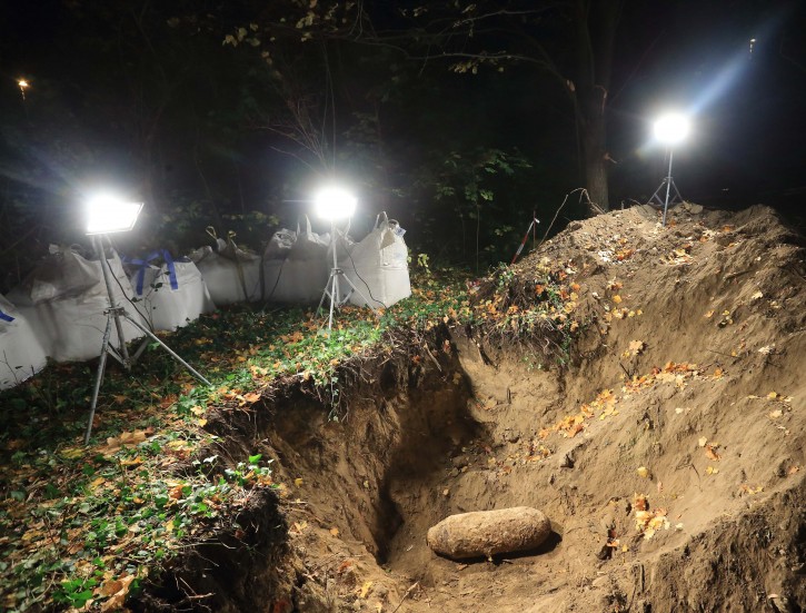A WWII bomb is shown under floodlights after a successful defusing in Magdeburg, Germany, 24 October 2013. A radius of 800 meters of parts of the city center of Magdeburg had to be evacuated during the operation to difuse the US Army Second World War bomb.  EPA/JENS WOLF