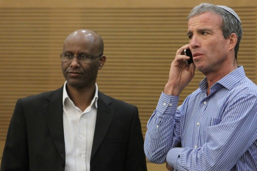 FILE - Elazar Stern (R) of the "Hatnua" party seen with Yesh Atid parliament member Shimon Solomon during an introduction day for new parliament members, in the Israeli parliament (knesset) on February 03, 2013. Photo by Miriam Alster/FLASH90 
