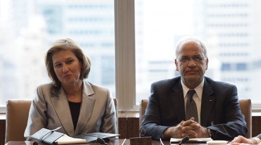Tzipi Livni (L), Israel's Minister of Justice, and Palestinian representative Saeb Erekat (R) sit together at the start of a meeting in New York, New York, USA, 27 September 2013. EPA FILE/JUSTIN LANE