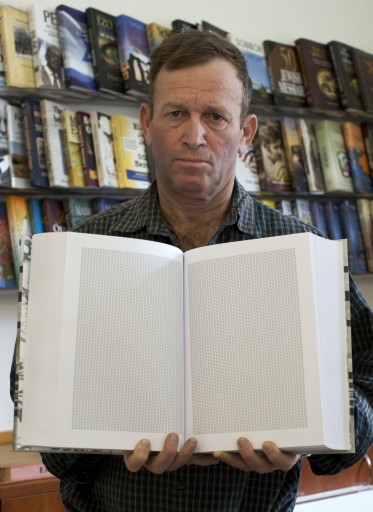  Ilan Greenfield, director of the Gefen Publishing House, shows a book entitled 'And Every Single One Was Someone,' which contains only one word, 'Jew,' written six million times over 1,250 pages, in  Jerusalem, Israel, 26 January 2014. The concept, more art than literature, began years ago by Phil Chernofsky, a teacher from Kew Gardens, New York, USA, who now lives in Israel. 