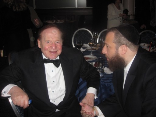 FILE - Ezra Friedlander, CEO The Friedlander Group in a discussion with Sheldon Adelson. Adelson is one of the biggest financial supporters of Birthright