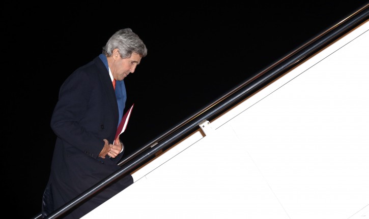 U.S. Secretary of State John Kerry departs Andrews Air Force Base, Md., en route to Ukraine, Monday, March 3, 2014. (AP Photo/Kevin Lamarque, Pool)