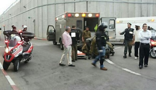 Photo on scene at Keiver Rachel 2 security forces being treated after being 
attacked by Palestinians. (Photo: Israel Hatzolah)