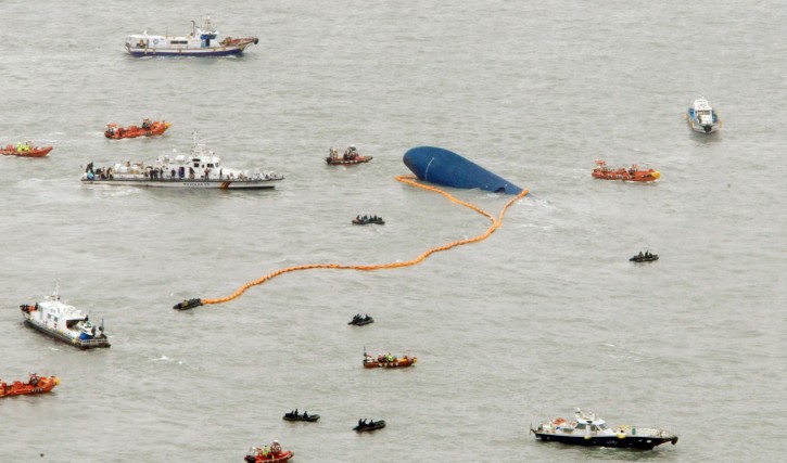 Ships take part in a rescue operation around the Sewol passenger ship, which sank in the sea off Jindo April 17, 2014. Rescuers fought rising winds, strong waves and murky waters on Thursday as they searched for hundreds of people, mostly teenage schoolchildren, still missing after the South Korean ferry capsized more than 24 hours ago. (REUTERS/Yonhap)