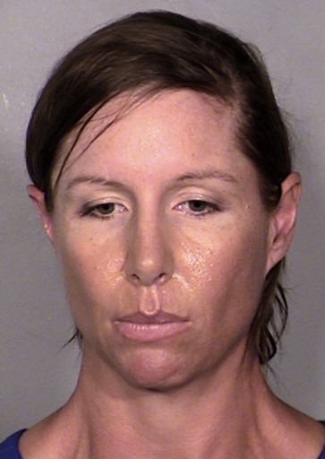 This image provided by the Las Vegas Metropolitan Police Department shows Alison Ernst, who was arrested April 10, 2014 in connection with an incident involving throwing a shoe at Former Secretary of State and Former First Lady Hillary Clinton.