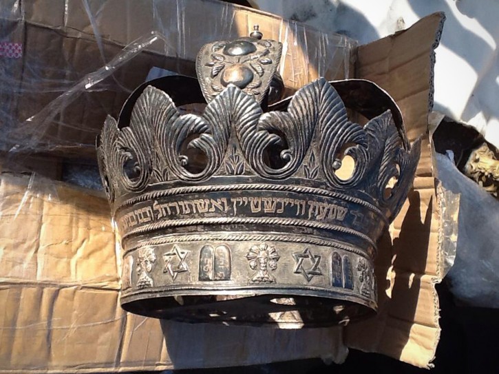 This image released by Egypt's Ministry of Antiquities on Friday, April 18, 2014 shows a crown from a cache of Jewish religious artifacts seized by officials in Damietta, Egypt that smugglers wanted to ship to Belgium at one of the country's main ports. (AP Photo/Egypt Ministry of Antiquities)