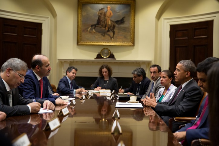 President Barack Obama drops by National Security Advisor Susan E. Rice's meeting with Syrian Opposition Coalition President Ahmad Jarba, second from left, in the Roosevelt Room of the White House, May 13, 2014. (Official White House Photo by Pete Souza)