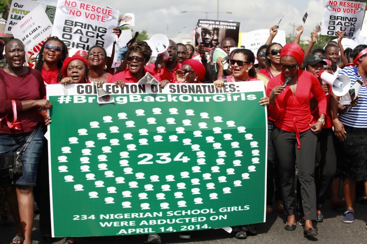 Women attend a mass-demonstration calling on the government to increase efforts to rescue the hundreds of missing kidnapped school girls of a government secondary school Chibok, in Lagos, Nigeria, Monday, May 5, 2014.  Leader of a protest march Saratu Angus Ndirpaya of Chibok town, said that Nigeria's First Lady ordered her and another protest leader to be arrested Monday, and expressed doubts there was any kidnapping and accused them of belonging to the Islamic insurgent group blamed for the abductions. Police say more than 300 girls and young women were abducted mid-April from Chibok Government Girls Secondary School, of whom some 53 girls are known to have escaped. (AP Photo/ Sunday Alamba)