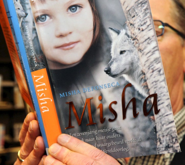 FILE -  Dutch edition of the book 'Misha: A memoire of the Holocaust Years' (Survivre avec les loups / Misha) by Belgian author Misha Defonseca, at the Dilbeek library, Belgium, 29 February 2008.  EPA