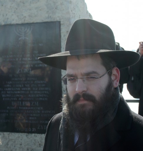 FILE - Rabbi Eliezer Gurary is standing in front of the monument on the site of the  former Jewish Ghetto during a memorial march in Krakow, Poland, 17 March 2013.  EPA