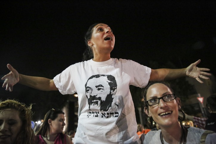 Rightwing activists wearing shirts that say "Kahana was right" counter protest the Leftwing rally that took place at Habima Square, Tel Aviv, on  July 3, 2014.  Flash90