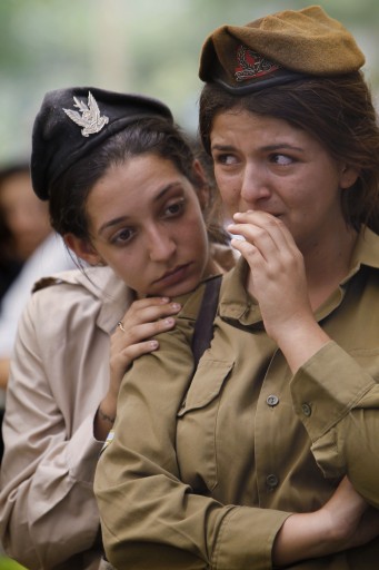 Israeli soldiers seen mourning at the funeral of Max Steinberg, a Golani brigade sharpshooter enlisted in the IDF in December 2012. Steinberg, originally from Los Angeles, California, was killed in action overnight on Sunday when the Golani Brigade operated extensively in the Gaza Strip. Thousands came to his funeral on Mt Herzl, in Jerusalem, on July 23, 2014.  Photo by Miriam Alster/FLASH90