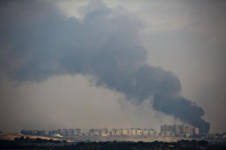 Smoke rises after an explosion in the northern Gaza Strip July 29, 2014.  Reuters