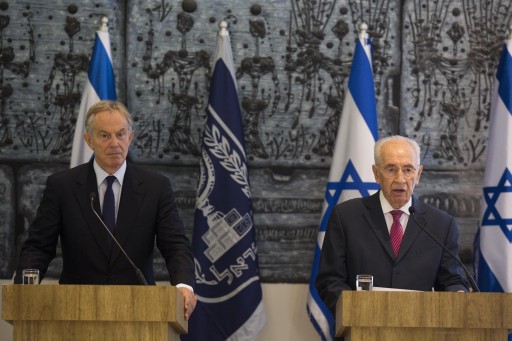 Middle East Quartet envoy Tony Blair (L) and Israeli President Shimon Peres (R) hold a joint news coference at the President's Residence in Jerusalem, 15 June 2014. EPA