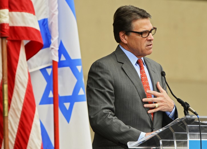  Texas Governor Rick Perry speaks in support of Israel during a rally outside Dallas City Hall in Dallas, Texas, USA, 30 July 2014. The Jewish Federation's Israel Solidarity Rally was to show support for Israel. The Israeli offensive in Gaza is on its 23rd day.  EPA/LARRY W. SMITH