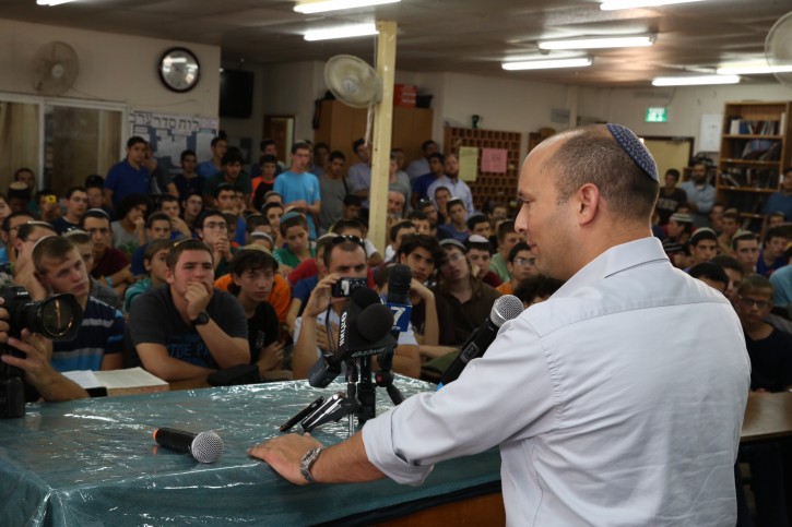 Minister of Economy, Naftali Bennet, speaks to students of the Or Haim Yeshiva in Gush Etzion, kicking off the first day of the new school year, on September 1, 2014. The Or Haim Yeshiva is where the three Jewish teens that were kidnapped and murdered (Naftali Frenkel, Eyal Ifrach, and Gil-ad Sha'ar) had studied. Photo by Flash90