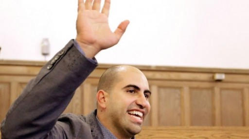 Steve Salaita, a professor who lost a job offer from the University of Illinois over dozens of profane Twitter messages that critics deemed anti-Semitic, speaks to students and reporters during a news conference at the University of Illinois campus Tuesday, September 9, 2014, in Champaign Ill. (AP/Seth Perlman) 