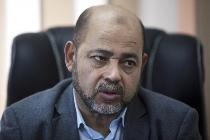 Palestinian Senior Hamas leader Moussa Abu Marzouk, speaks during an interview with The Associated Press in his office in Gaza City, Thursday, Sept. 18, 2014. Hamas' No. 2 leader says the Islamic militant group does not want another war with Israel but suggests more fighting is inevitable unless Israel ends its blockade of Hamas-ruled Gaza. Marzouk said in an interview Thursday that Hamas emerged stronger from the recent 50-day war, despite military setbacks. (AP Photo/Khalil Hamra)