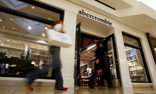 Shoppers make their way past an Abercrombie & Fitch store in a file photo. REUTERS/John Gress