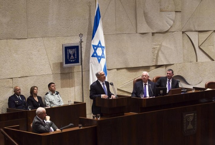 Israel's Prime Minister Benjamin Netanyahu speaks at the opening of the winter session of the Knesset, the Israeli parliament, in Jerusalem October 27, 2014.  REUTERS