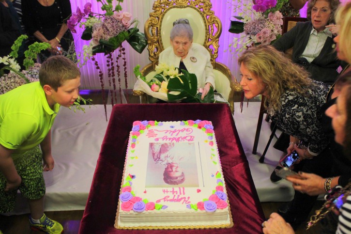 Oct. 30, 2014 - Family members of 114 year old Goldie blow out the candles on her cake. Credits: Roy Renna / BMR Breaking News