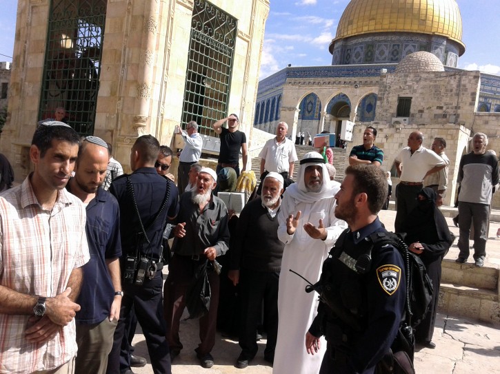 Palestinians protesting to Israeli police as religious right-wing Jews, part of a larger group, tour the Temple Mount, or the Hareem el-Sharif (The Noble Sanctuary) to the Moslem world, in the Old City of Jerusalem, 01 October 2014. EPA