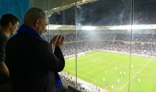 File Photo of Israel's Prime Minister Benjamin Netanyahu watching the Euro 2016 Group B qualifying soccer match between Israel and Bosnia Herzegovina at Haifa's Sammy Ofer Stadium in this November 16, 2014 file photo.
(CREDIT: Amos Ben Gershom, GPO)