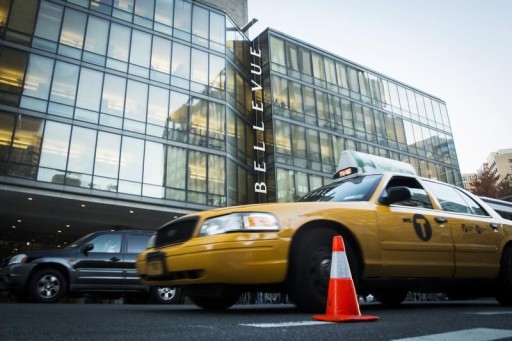 FILE - Traffic drives pass Bellevue Hospital in New York October 27, 2014. REUTERS