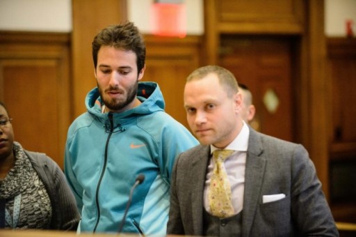 File: Yonathan Souid appears in court with his lawyer James Medows (right) after Souid was charged with scaling the Brooklyn Bridge Sunday. (courtesy Daily News) 