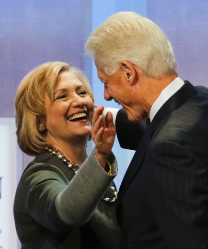 Former US President Bill Clinton with his wife former US Secretary of State Hillary Rodham Clinton (L) in New York, USA, 22 September 2014. EPA/RAY STUBBLEBINE