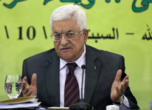 FILE - In this Oct. 18, 2014 file photo, Palestinian President Mahmoud Abbas speaks during a meeting of the Fatah revolutionary council in the West Bank city of Ramallah. Abbas has threatened to stop security coordination with Israel if the country continues to withhold millions of dollars of Palestinian tax revenue, a senior Palestinian official said Sunday, Feb. 22, 2015. (AP Photo/Majdi Mohammed, File)