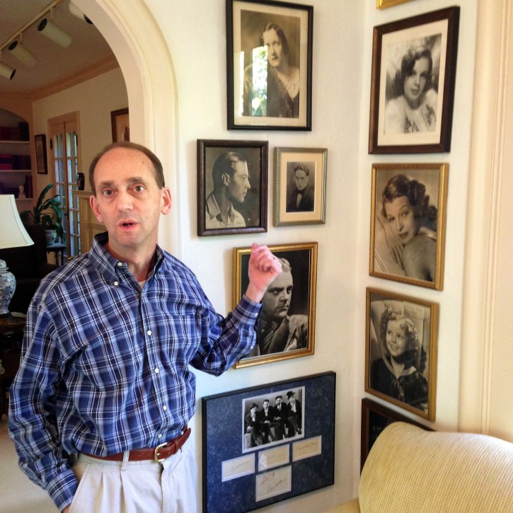 FILE - In tis Oct. 16, 2014 file photo Missouri Auditor Tom Schweich shows off some of the movie-star photos in his collection of autographed memorabilia from the golden age of Hollywood during at his home in Clayton, Mo. Schweich, a Republican candidate for governor, died Thursday Feb. 26, 2015 of a self-inflicted gunshot wound, a staff member told The Associated Press.  (By David A. Lieb, File)