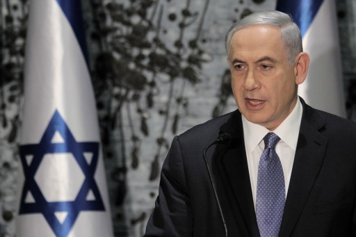 Israeli Prime Minister Benjamin Netanyahu speaks during a ceremony with Israeli President Reuven Rivlin, in Jerusalem, Wednesday, March 25, 2015.  Netanyahu struck a conciliatory tone on Wednesday as he was formally tapped to form a new government, vowing to heal rifts in Israeli society and fix ties with the United States following an acrimonious election campaign. (AP Photo/Dan Balilty)