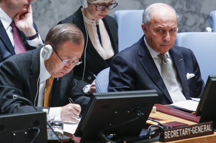 French Foreign Minister Laurent Fabius (R) looks at United Nations Secretary-General Ban Ki-moon (R), during a United Nations Security Council meeting about victims of attacks and abuses on ethnic or religious grounds in the Middle East at United Nations headquarters in New York, New York, USA, 27 March 2015.  EPA/EDUARDO MUNOZ