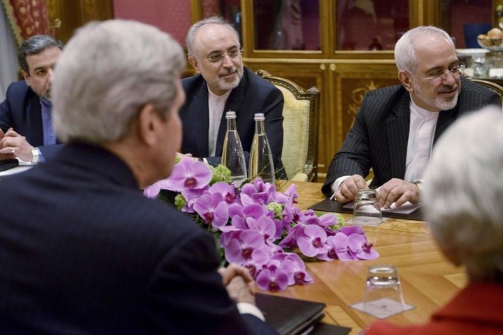 FILE - (From left) Iranian Deputy Foreign Minister Abbas Araghchi, US Secretary of State John Kerry, Head of Iranian Atomic Energy Organisation Ali Akbar Salehi, Iranian Foreign Minister Javad Zarif and US Under Secretary for Political Affairs Wendy Sherman wait for a meeting at the Beau Rivage Palace Hotel on March 27, 2015 in Lausanne. Reuters