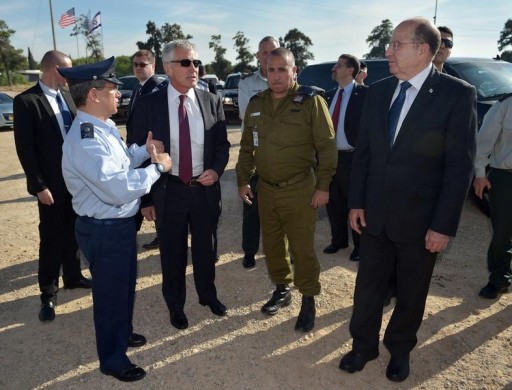 FILE - U.S. Defense Secretary Chuck Hagel (4th L) and Israeli Defense Minister Moshe Ya'alon (R) listen to Commander in Chief of the Israeli Air Force Major-General Amir Eshel (front L) as they arrive to address U.S. and Israeli soldiers after viewing the Juniper Cobra 14 military exercise at Hatzor Israeli Air Force Base in central Israel, near Hatzor kibbutz May 15, 2014. REUTERS