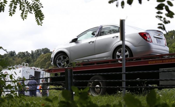 A getaway car of suspected gunman Vester L. Flanagan  sits on a flatbed tow truck before being towed away on highway I-66 in Fauquier County, Virginia August 26, 2015.REUTERS/Kevin Lamarque