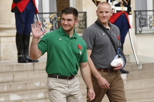 US servicemen Alek Skarlatos (L) and Spencer Stone (R) leave the Elysee Palace after an honorary ceremony with French President Francois Hollande at the Elysee Palace in Paris, France, 24 August 2015. EPA/YOAN VALAT