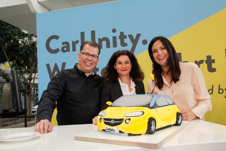 Carsharing trio: Director Opel Community Carsharing Jan Wergin, Opel CMO Tina Müller and Opel campaign ambassador Bettina Zimmermann at the press conference in the Adam Opel Haus. Opel is a division of GM