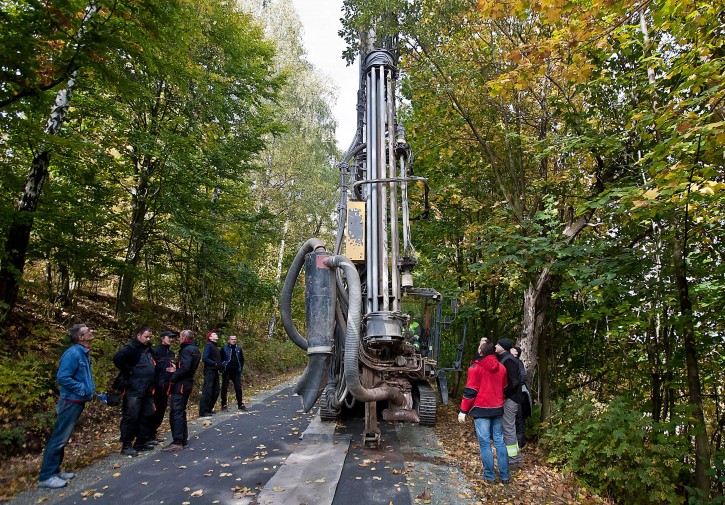 A team hired by local authorities is drilling near Walim, southwestern Poland, on Saturday, Oct. 10, 2015 to verify an explorers claim that a system of secret Nazi tunnels and shelters is hidden underground. Water emerged from each of the drilled holes. The findings are to be made public on Oct. 15, 2015. The explorer, Krzysztof Szpakowski, claims the tunnels could be hiding anything from technical appliances to armaments, but not a gold train, that, local lore says, the Nazis hid in 1945.  (AP Photo) 