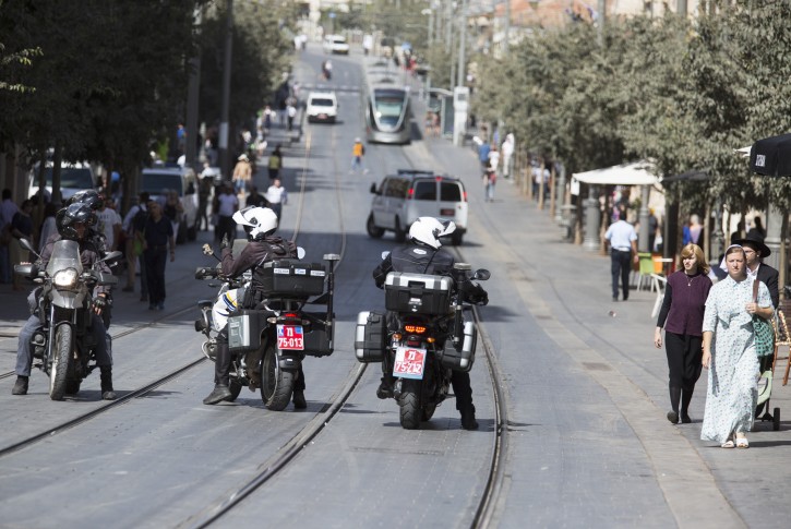 Israeli police patrol central Jerusalem's Jaffa Road where the Light Rail trolley runs  15 October 2015.  EPA