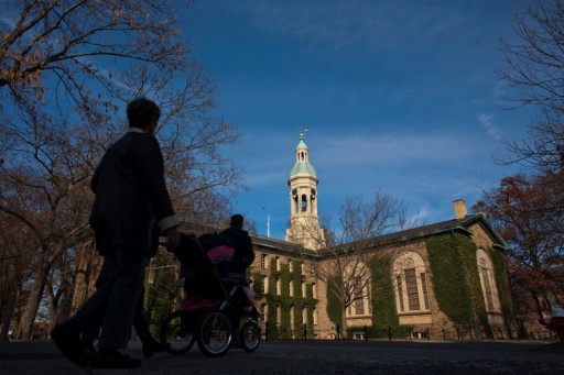 People walk around the Princeton University campus in New Jersey, November 16, 2013.  REUTERS/Eduardo Munoz