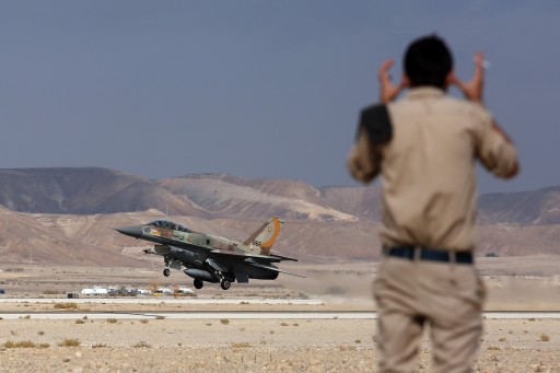File: An Israeli soldiers protects his ears as an Israeli F-16 jet takes off at the Ovda airbase in the Negev Desert near Eilat, southern Israel. EPA/ABIR SULTAN