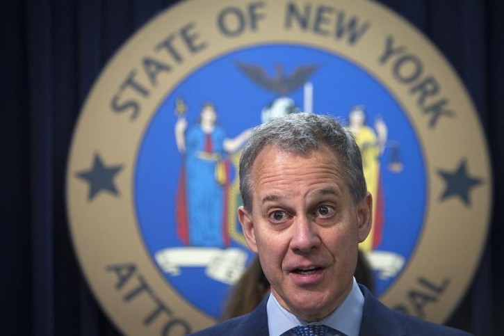 FILE - New York State Attorney General Eric Schneiderman speaks during a news conference in the Manhattan borough of New York August 21, 2014. REUTERS